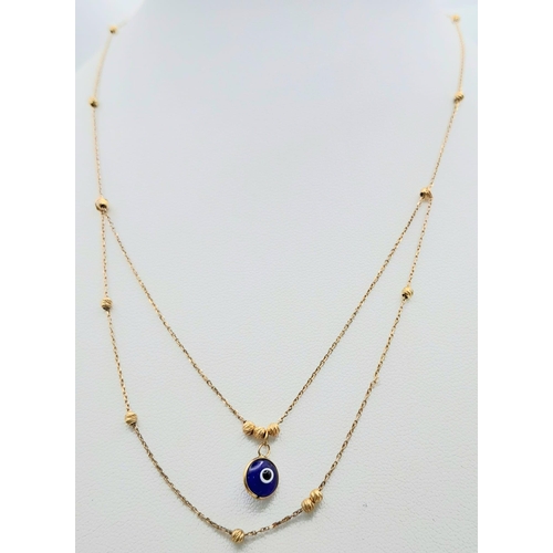 1191 - An 18K Yellow Gold Evil Eye Choker Necklace. 38cm length.
2g total weight.