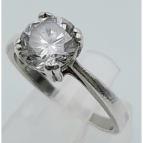 1261 - Magnificent Round Cut Cubic Zirconia, Sterling Silver Ring. Sparkles for days.
Size: P
Weight:  3.39... 