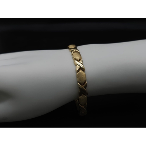 127 - A Stylish Italian 14K Yellow Gold Hexagonal and X-Link Bracelet. 18cm. 11.9g weight.