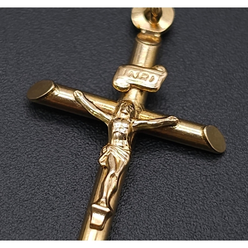 1691 - A 9K Yellow Gold Crucifix Pendant. 3cm x 2cm. 1.1g weight.