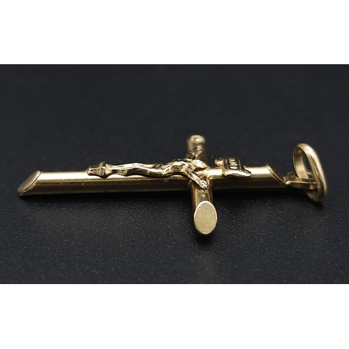 1691 - A 9K Yellow Gold Crucifix Pendant. 3cm x 2cm. 1.1g weight.