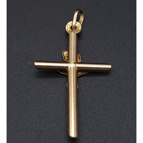 1691 - A 9K Yellow Gold Crucifix Pendant. 3cm x 2cm. 1.1g weight.