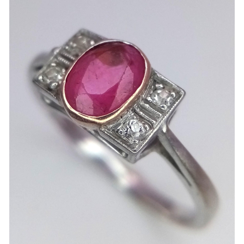 179 - A VINTAGE 18K WHITE GOLD DIAMOND & RUBY RING. Size Q, 2.5g total weight.