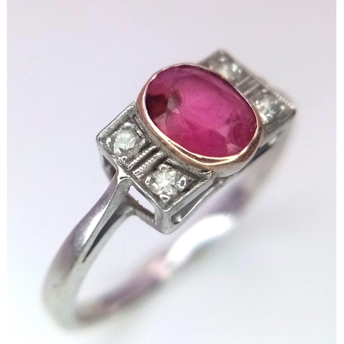 179 - A VINTAGE 18K WHITE GOLD DIAMOND & RUBY RING. Size Q, 2.5g total weight.