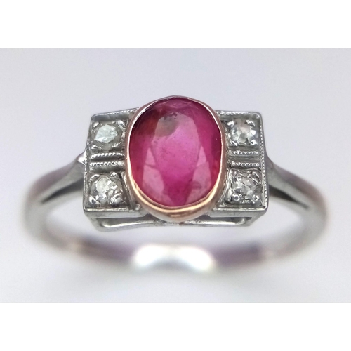 179 - A VINTAGE 18K WHITE GOLD DIAMOND & RUBY RING. Size Q, 2.5g total weight.