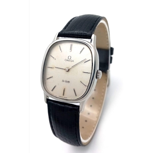 19 - AN OMEGA DE VILLE IN STAINLESS STEEL WITH MANUAL WINDING MOVEMENT AND ON A BLACK LEATHER STRAP .   3... 