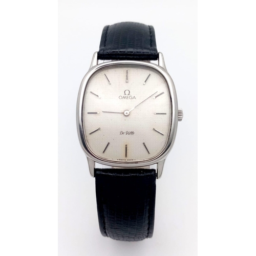 19 - AN OMEGA DE VILLE IN STAINLESS STEEL WITH MANUAL WINDING MOVEMENT AND ON A BLACK LEATHER STRAP .   3... 