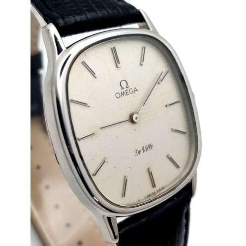 19 - AN OMEGA DE VILLE IN STAINLESS STEEL WITH MANUAL WINDING MOVEMENT AND ON A BLACK LEATHER STRAP .   3... 