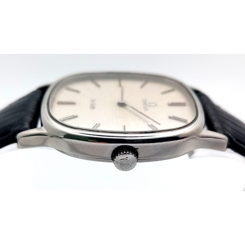 19 - AN OMEGA DE VILLE IN STAINLESS STEEL WITH MANUAL WINDING MOVEMENT AND ON A BLACK LEATHER STRAP .   3... 