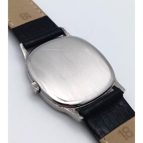 19 - AN OMEGA DE VILLE IN STAINLESS STEEL WITH MANUAL WINDING MOVEMENT AND ON A BLACK LEATHER STRAP .   3... 