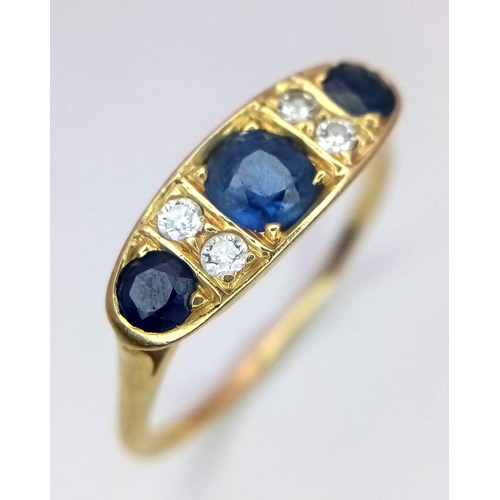 193 - AN 18K YELLOW GOLD DIAMOND & SAPPHIRE RING. Size T, 0.60ctw sapphires, 2.9g total weight.