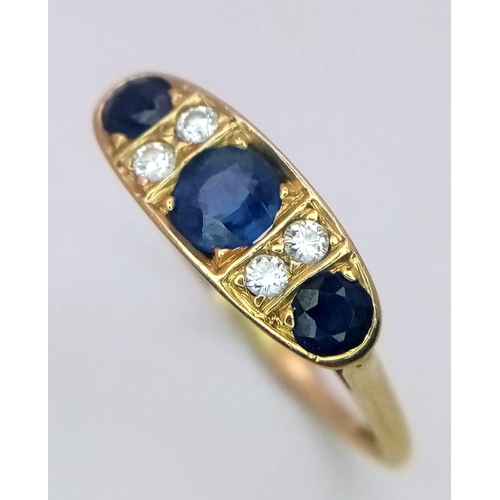 193 - AN 18K YELLOW GOLD DIAMOND & SAPPHIRE RING. Size T, 0.60ctw sapphires, 2.9g total weight.