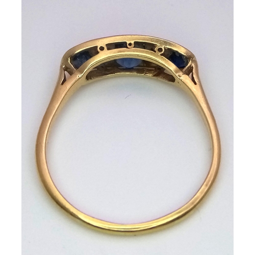 193 - AN 18K YELLOW GOLD DIAMOND & SAPPHIRE RING. Size T, 0.60ctw sapphires, 2.9g total weight.