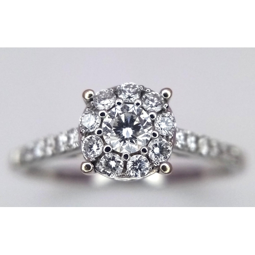 250 - AN 18K WHITE GOLD DIAMOND RING. Size S, 0.60ctw, 3g total weight.