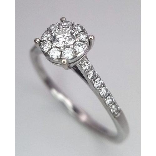 250 - AN 18K WHITE GOLD DIAMOND RING. Size S, 0.60ctw, 3g total weight.