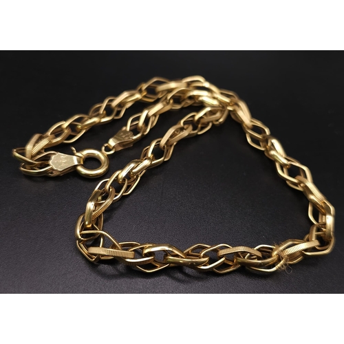 275 - An 18K Yellow Gold Intricate Link Chain/Necklace. 40cm length. 9.9g weight.