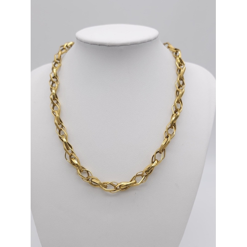 275 - An 18K Yellow Gold Intricate Link Chain/Necklace. 40cm length. 9.9g weight.