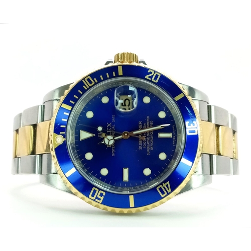 33 - A Classic Rolex Oyster Bi-Metal Submariner Gents Watch. 18K Gold and stainless steel bracelet and ca... 