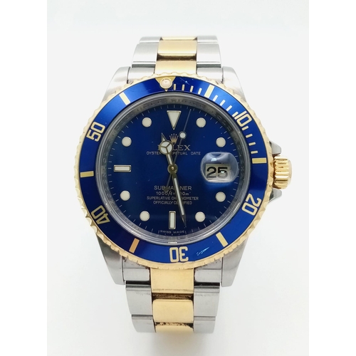 33 - A Classic Rolex Oyster Bi-Metal Submariner Gents Watch. 18K Gold and stainless steel bracelet and ca... 