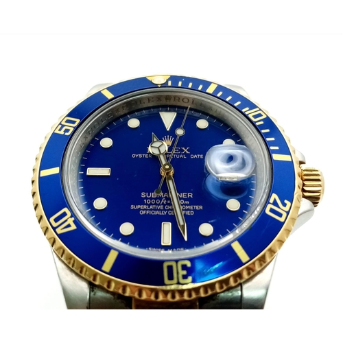 33 - A Classic Rolex Oyster Bi-Metal Submariner Gents Watch. 18K Gold and stainless steel bracelet and ca... 