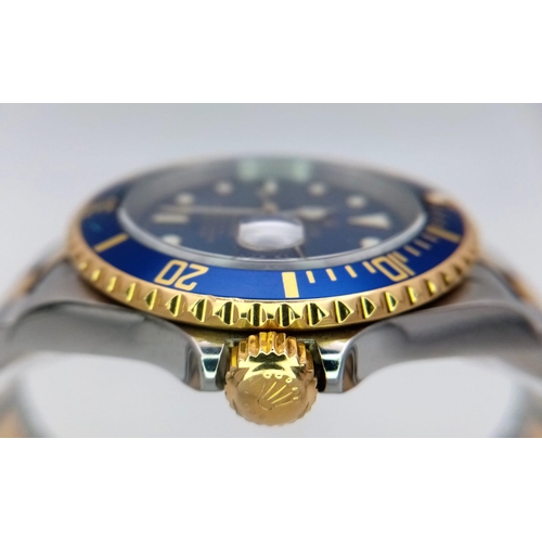 33 - A Classic Rolex Oyster Bi-Metal Submariner Gents Watch. 18K Gold and stainless steel bracelet and ca... 