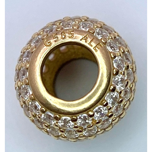 383 - A 14K YELLOW GOLD STONE SET PANDORA CHARM. 2.3g total weight.    Ref: SC 7016