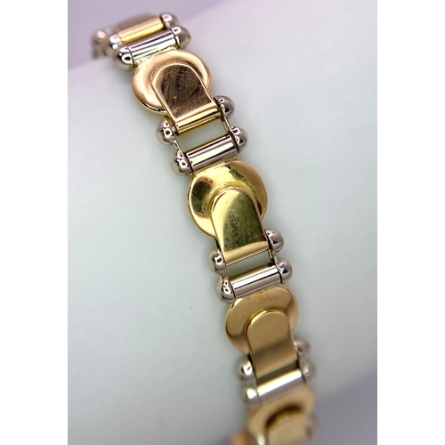 555 - A Designer Baraka 18K Yellow and White Gold Fancy Link Bracelet. 20cm. 29.35g weight.