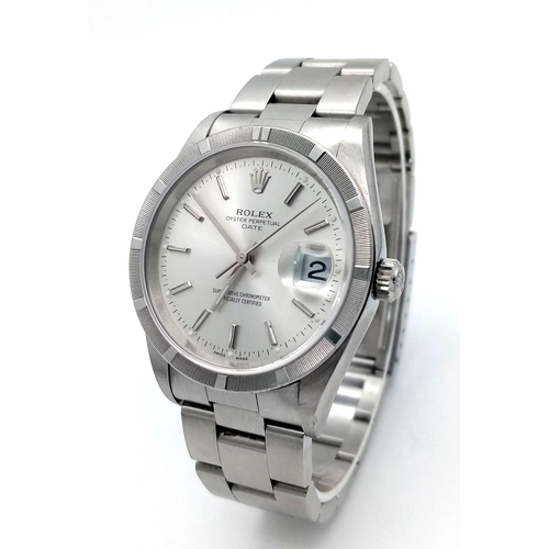 61 - A Rolex Oyster Perpetual Datejust Gents Watch. Stainless steel bracelet and case - 35mm. Silver tone... 