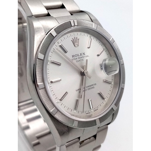 61 - A Rolex Oyster Perpetual Datejust Gents Watch. Stainless steel bracelet and case - 35mm. Silver tone... 