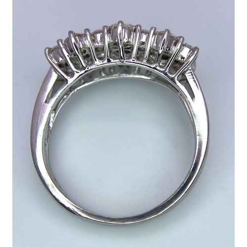 96 - 18K WHITE GOLD, FANCY TRIPLE DIAMOND CLUSTER RING.
0.80CTW, weighs 5.9G.
SIZE: N

REF: RPM 7002