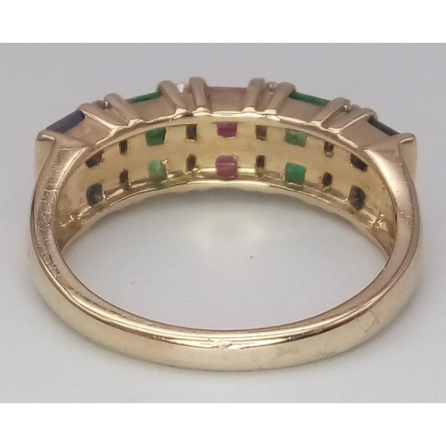 242 - 9K YELLOW GOLD DIAMOND, RUBY, EMERALD & SAPPHIRE RING. WEIGHS 3.5G AND SIZE M.

REF: SC 7087