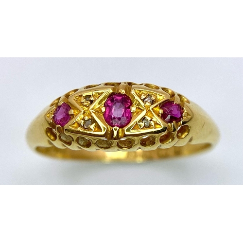 313 - AN ANTIQUE 18K YELLOW GOLD DIAMOND AND RUBY RING. Hallmarked Birmingham, 1923. Size N, 2.6g total we... 