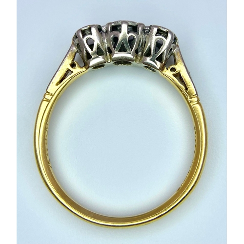 320 - AN 18K YELLOW GOLD & PLATINUM VINTAGE 3 STONE DIAMOND RING. Size N, 2.8g total weight.