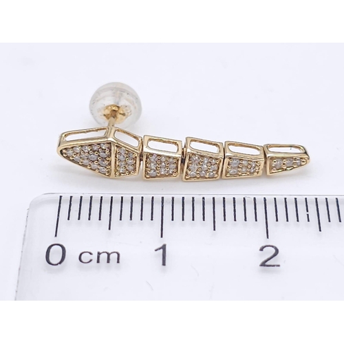 367 - A Serpentine 18K Yellow Gold and Diamond Ring with a Pair of 18K Yellow Gold and Diamond Drop Earrin... 