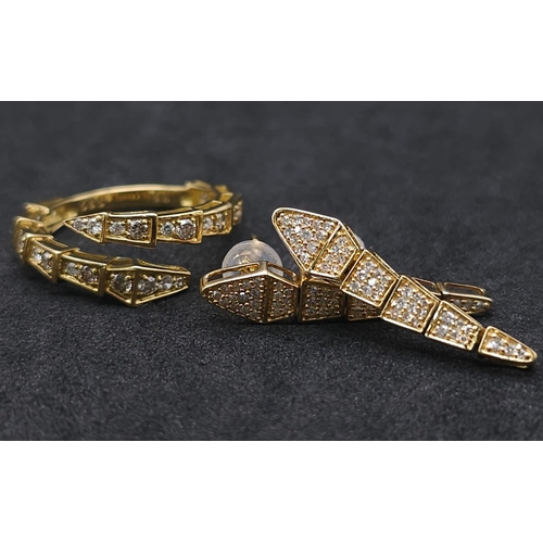 367 - A Serpentine 18K Yellow Gold and Diamond Ring with a Pair of 18K Yellow Gold and Diamond Drop Earrin... 