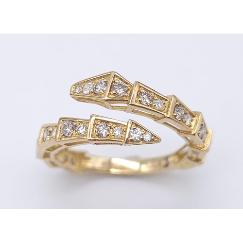 367 - A Serpentine 18K Yellow Gold and Diamond Ring with a Pair of 18K Yellow Gold and Diamond Drop Earrin... 