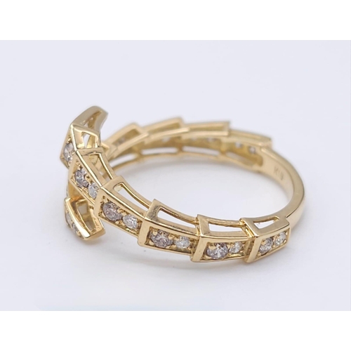 367 - A Serpentine 18K Yellow Gold and Diamond Ring with a Pair of 18K Yellow Gold and Diamond Drop Earrin... 