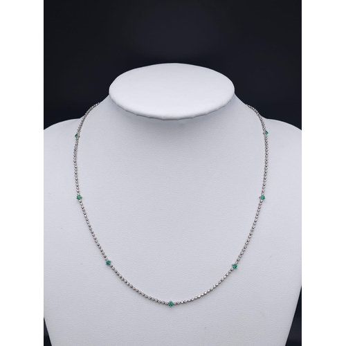 785 - An 18K White Gold, Diamond, Emerald Pendant and a Platinum, Diamond and Emerald Necklace. Pendant - ... 