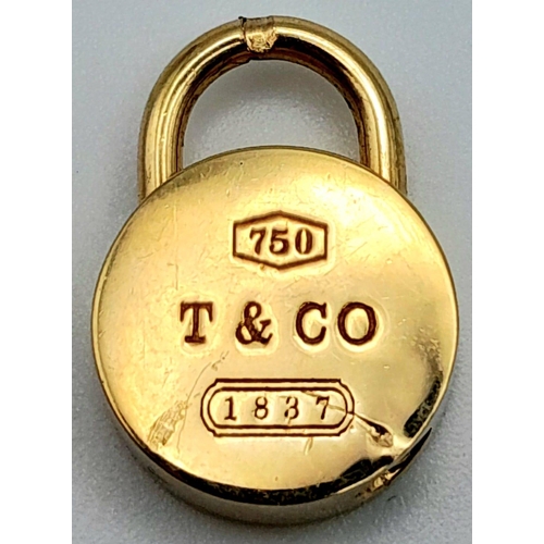 82 - 18K YELLOW GOLD GENUINE TIFFANY & CO ROUND LOCKET.
WEIGHS 13.5G AND MEASURES 2CM.

REF: SC 7088