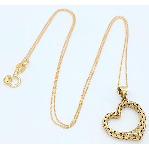 261 - An 18K Yellow Gold Heart Pendant on an 18K Yellow Gold Necklace. 2cm pendant. 40cm necklace length. ... 