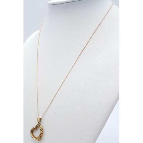 261 - An 18K Yellow Gold Heart Pendant on an 18K Yellow Gold Necklace. 2cm pendant. 40cm necklace length. ... 