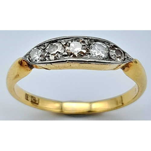 299 - AN 18K GOLD AND PLATINUM VINTAGE DIAMOND RING .  1.2gms   size I