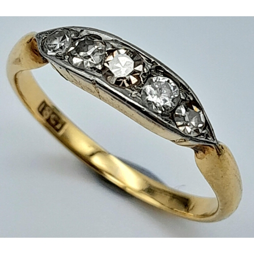 299 - AN 18K GOLD AND PLATINUM VINTAGE DIAMOND RING .  1.2gms   size I