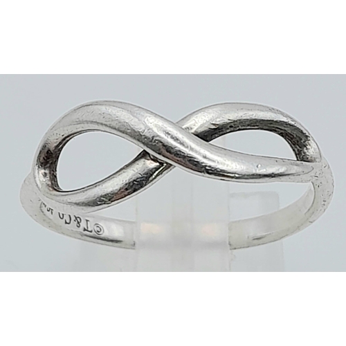 790 - TIFFANY & CO STERLING SILVER INFINITY RING.
RRP £290
WEIGHT: 2G 
SIZE M

REF: RPM 7004