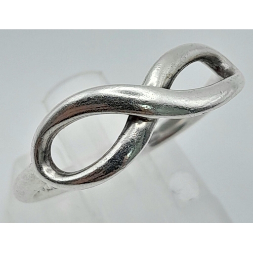 790 - TIFFANY & CO STERLING SILVER INFINITY RING.
RRP £290
WEIGHT: 2G 
SIZE M

REF: RPM 7004