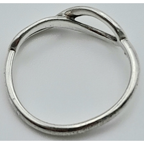 790 - TIFFANY & CO STERLING SILVER INFINITY RING.
RRP £290
WEIGHT: 2G 
SIZE M

REF: RPM 7004