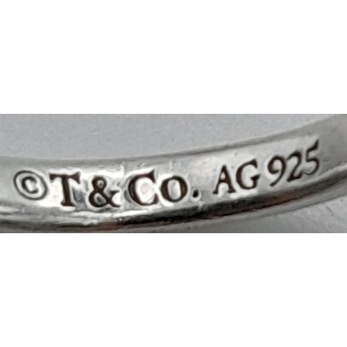 790 - TIFFANY & CO STERLING SILVER INFINITY RING.
RRP £290
WEIGHT: 2G 
SIZE M

REF: RPM 7004