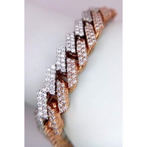 591 - A 10K, TWO-COLOUR FULLY DIAMOND SET CUBAN BRACELET - OVER 6CTW OF GORGEOUS WHITE DIAMONDS.  85.2 TOT... 