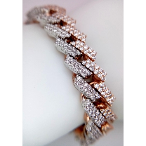 591 - A 10K, TWO-COLOUR FULLY DIAMOND SET CUBAN BRACELET - OVER 6CTW OF GORGEOUS WHITE DIAMONDS.  85.2 TOT... 