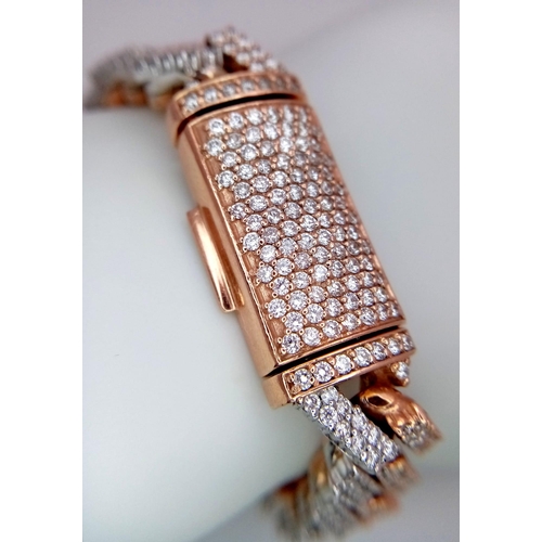 591 - A 10K, TWO-COLOUR FULLY DIAMOND SET CUBAN BRACELET - OVER 6CTW OF GORGEOUS WHITE DIAMONDS.  85.2 TOT... 